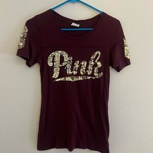 Pink Victoria’s Secret maroon and gold shirt